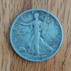 Here is the same unacceptable image, zoomed in, and cropped properly. Detail is still lacking. Here, it's best to retake the photograph with the camera closer to the coin.
